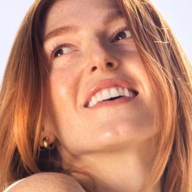 Sky Organics applied to hair ends demonstrating conditioning and shine
