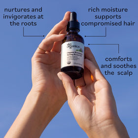 Sky Organics ingredients label showing macadamia, jojoba, rosemary benefits