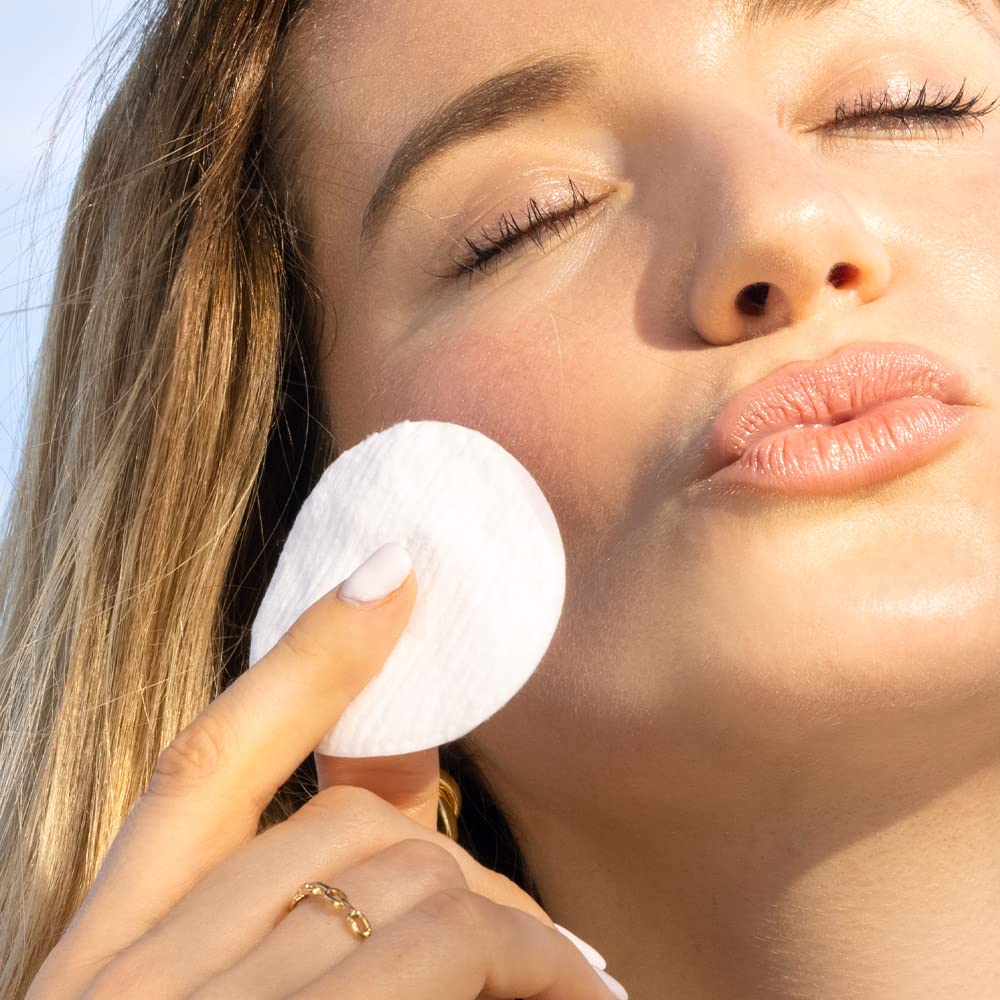 Sky Organics cotton pad removing makeup gently around the eye area