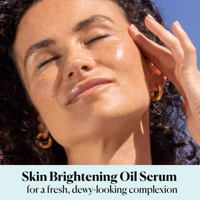 Sky Organics serum dropper dispensing a golden drop highlighting precision and control