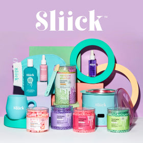Sliick bottle on bathroom counter with towel illustrating calming post-wax ritual benefit
