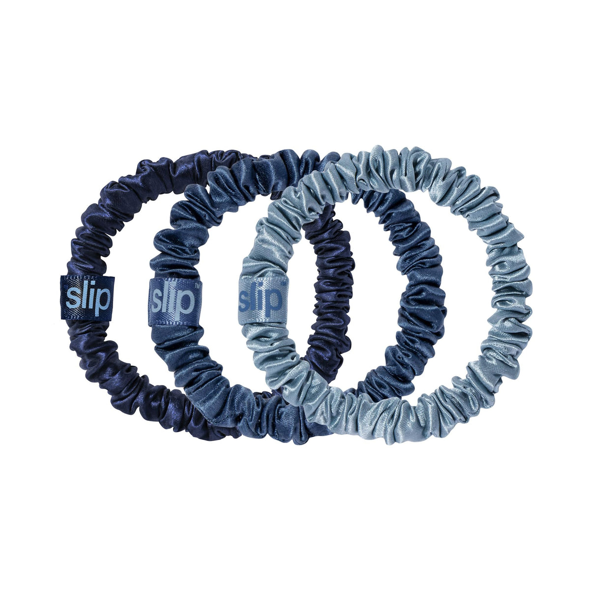 SLIP silk scrunchie front packaging showing navy and sapphire colors, protective hold