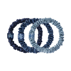 SLIP silk scrunchie front packaging showing navy and sapphire colors, protective hold