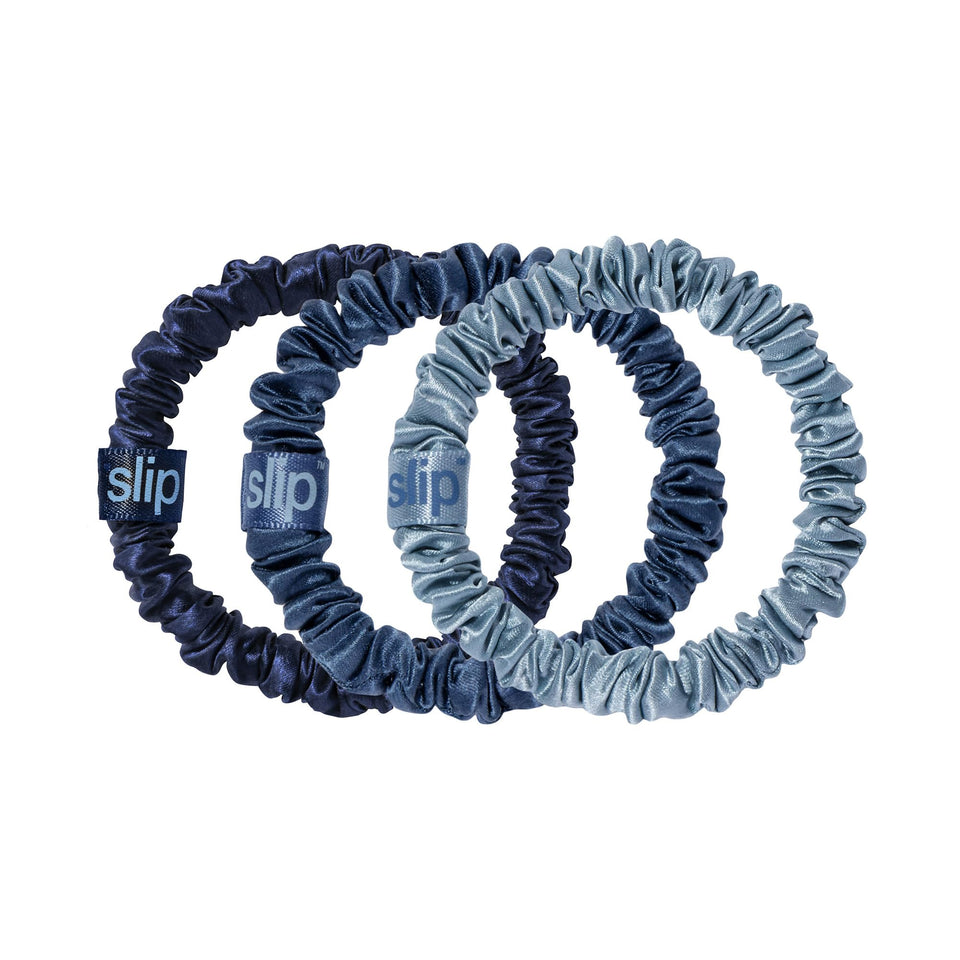 SLIP silk scrunchie front packaging showing navy and sapphire colors, protective hold