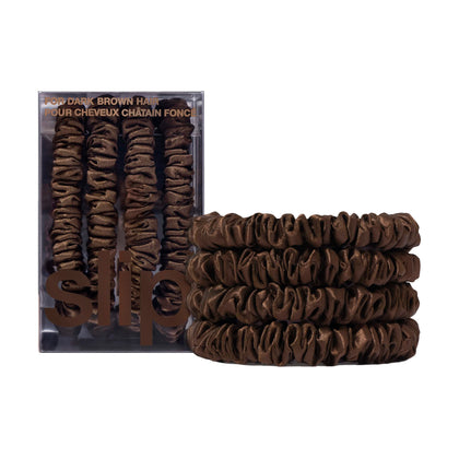 SLIP front packaging showing four skinny silk scrunchies, elegant storage benefit