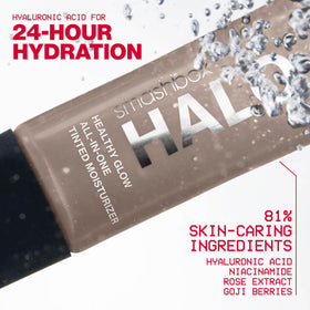 Smashbox Halo 1.4 fl oz bottle next to a ruler for size clarity