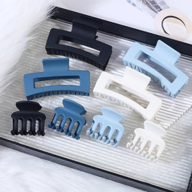 SMKSL banana clip holding a half-up hairstyle showing lightweight comfort and control