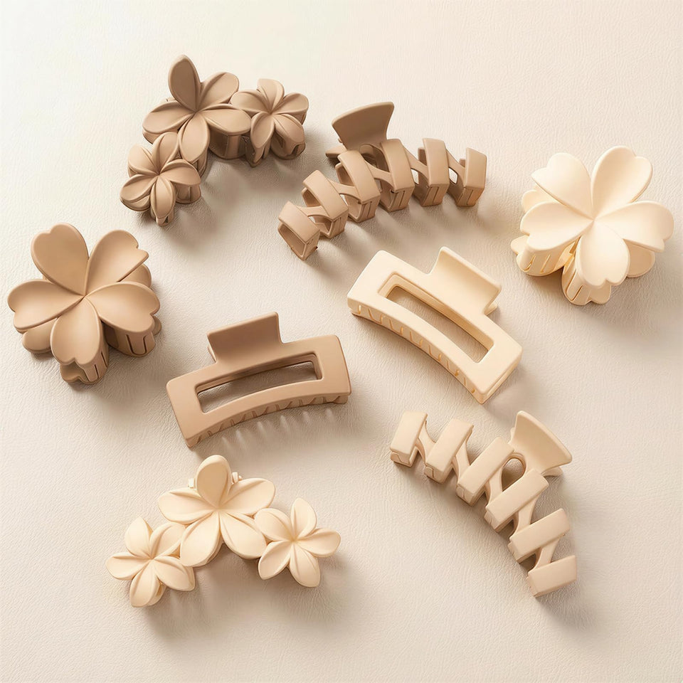 SMKSL front view of four neutral flower claw clips shows stylish everyday accessory