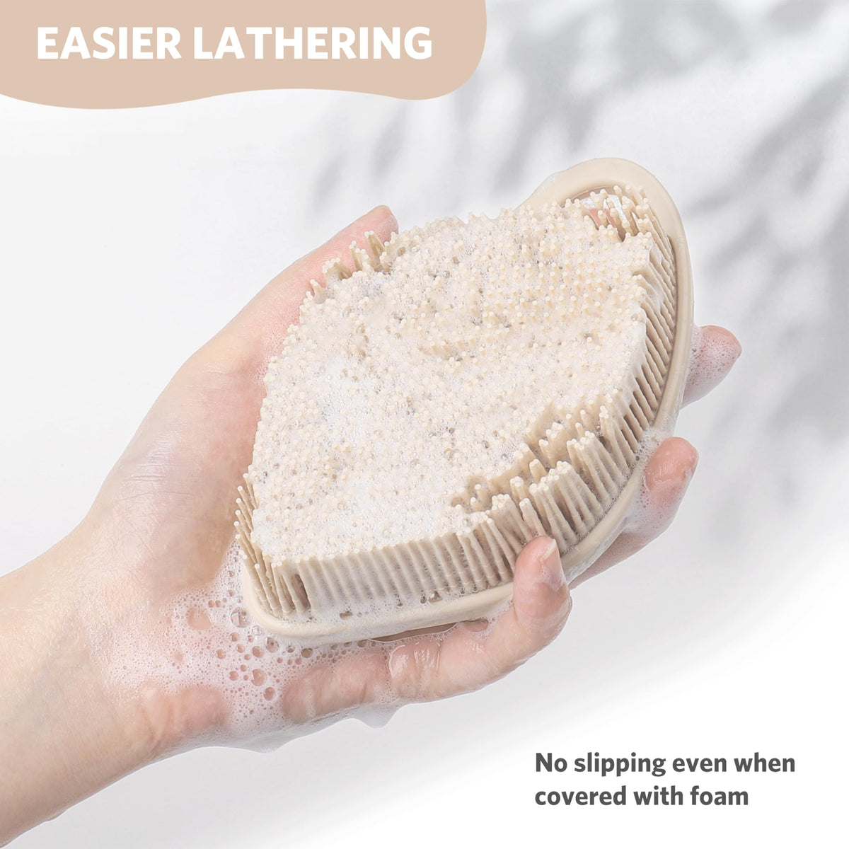 Sndyi silicone scrubber being rinsed under tap showing easy cleaning benefit