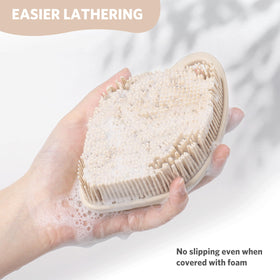 Sndyi silicone scrubber being rinsed under tap showing easy cleaning benefit