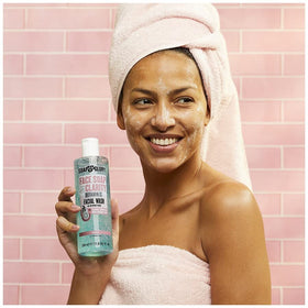 Soap & Glory beside a common item showing 11.8 fl oz size for scale