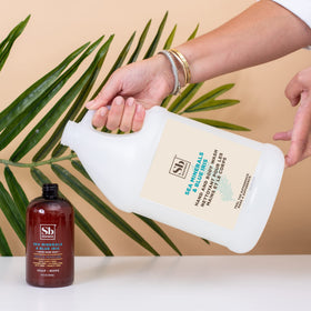 Soapbox being poured into dispenser demonstrating easy refill benefit