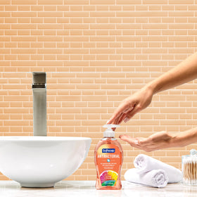 Softsoap label close-up displaying antibacterial information and benefits