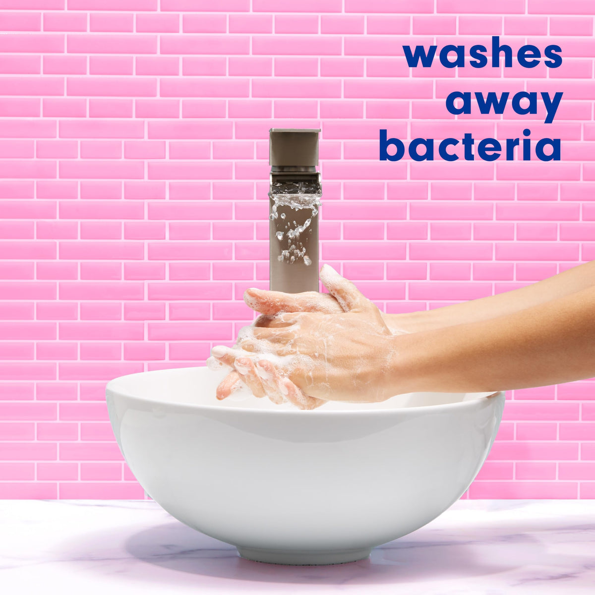 Softsoap on bathroom vanity adding tropical scent and decorative touch
