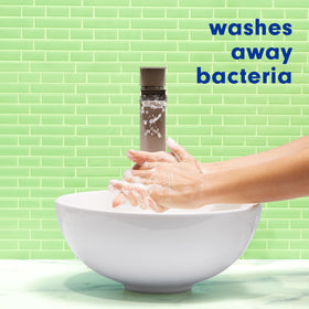 Softsoap pouring texture showing creamy formula that hydrates during wash