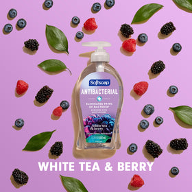 White tea and berry still life beside Softsoap bottle, scent cues for pleasant fragrance