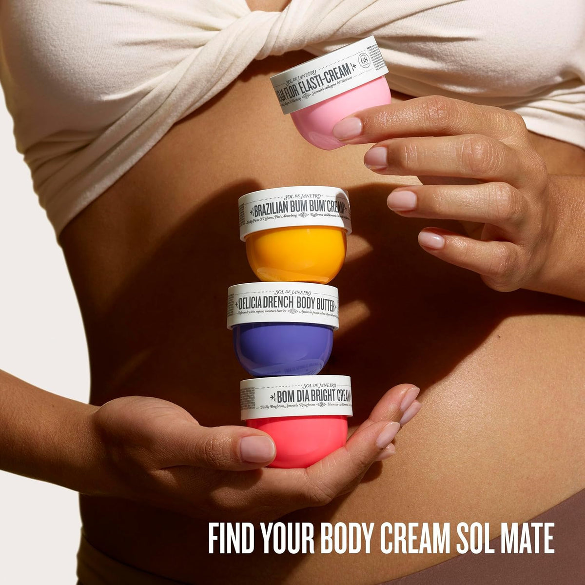 Bom Dia Bright Cream applied to leg illustrating gentle exfoliation and brighter-looking skin from Sol de Janeiro