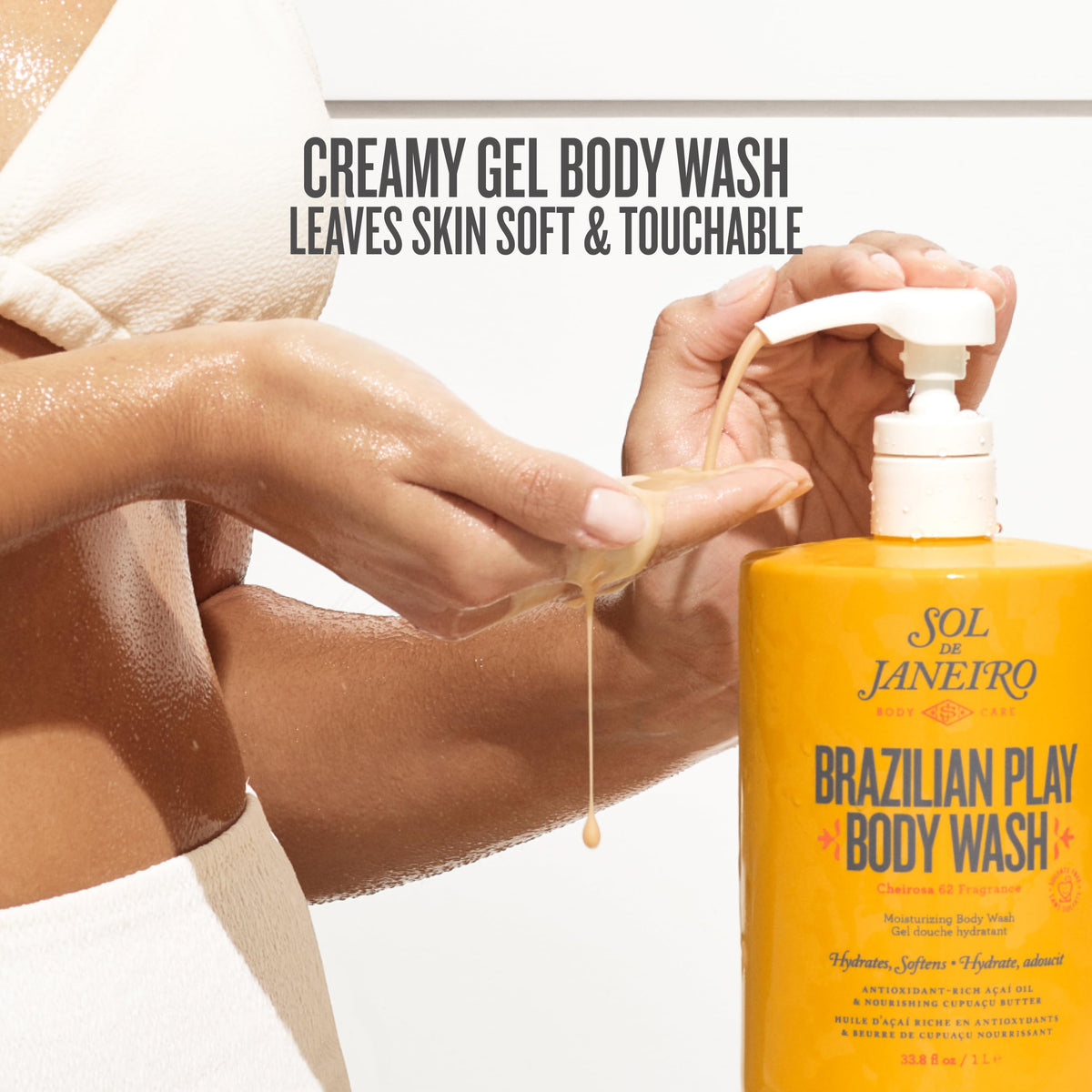 Sol de Janeiro pump in use dispensing creamy gel for controlled, mess-free showers