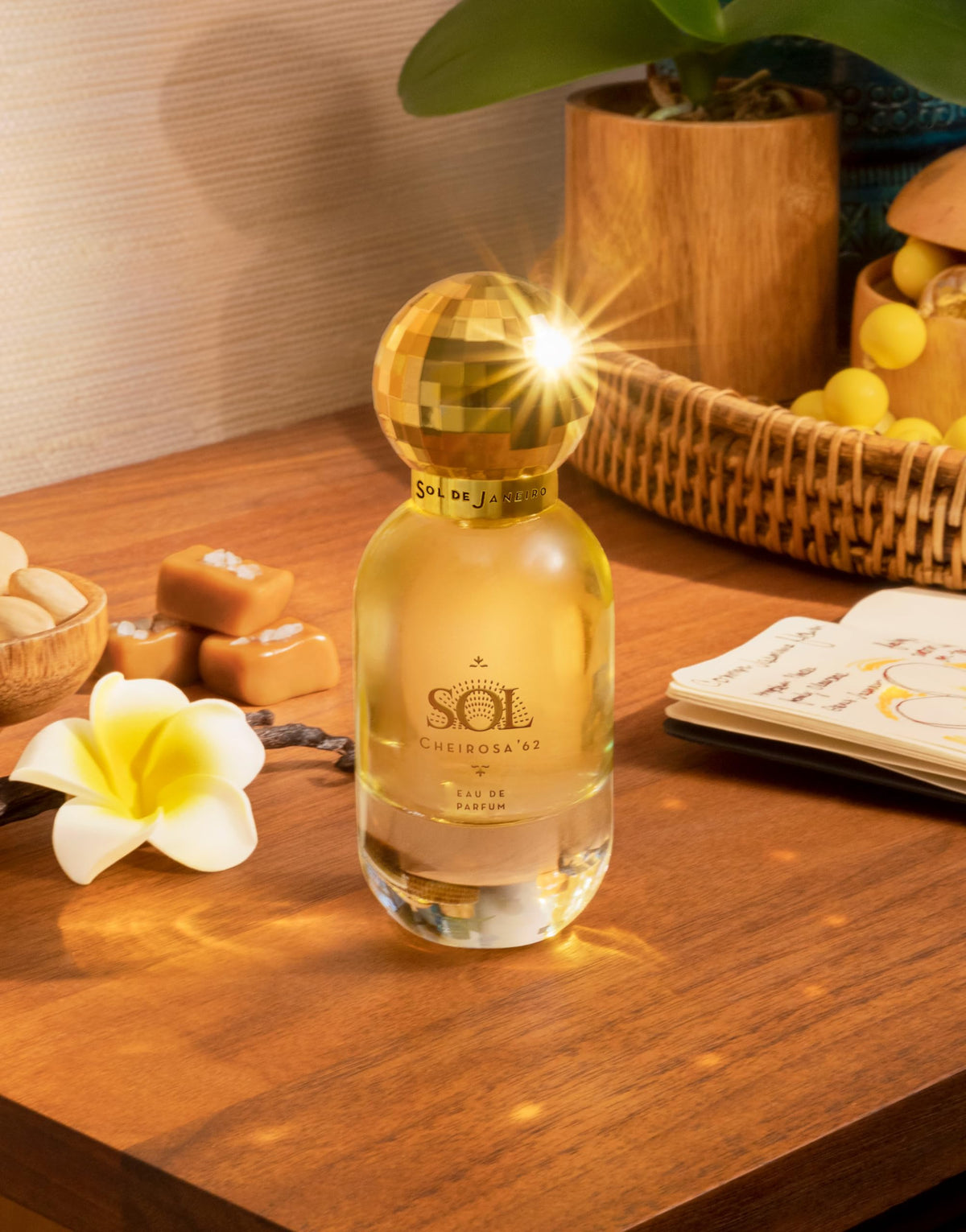 Sol de Janeiro perfume spray in motion illustrating fine mist for even application