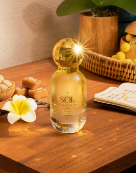 Sol de Janeiro perfume spray in motion illustrating fine mist for even application