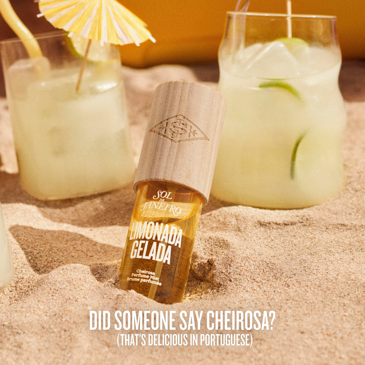 Sol de Janeiro bottle with sunglasses and towel evoking beach-ready vibe