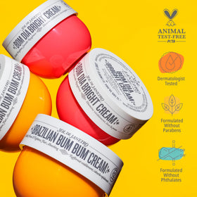 Sol de Janeiro open jars with swatch on skin showing finish and scent appeal