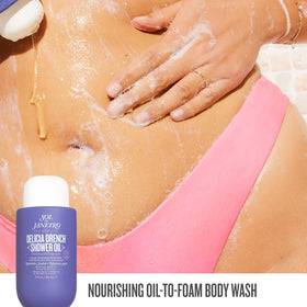 Sol de Janeiro perfume mist spraying into air offering instant fragrance refresh