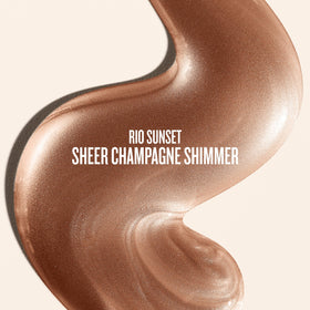 Sol de Janeiro close-up oil drop on fingertip highlighting shimmer