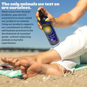 Solar Recover bottle inside beach bag with towel and sunscreen illustrating outdoor use