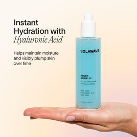 Solawave bottle held in hand showing 1 oz scale and travel-friendly benefit