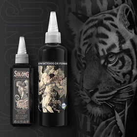 Solong Tattoo bottle on a clean workstation depicting professional studio use