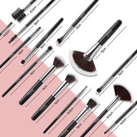 SOLVE hand holding brushes to show size and scale for comfortable professional use