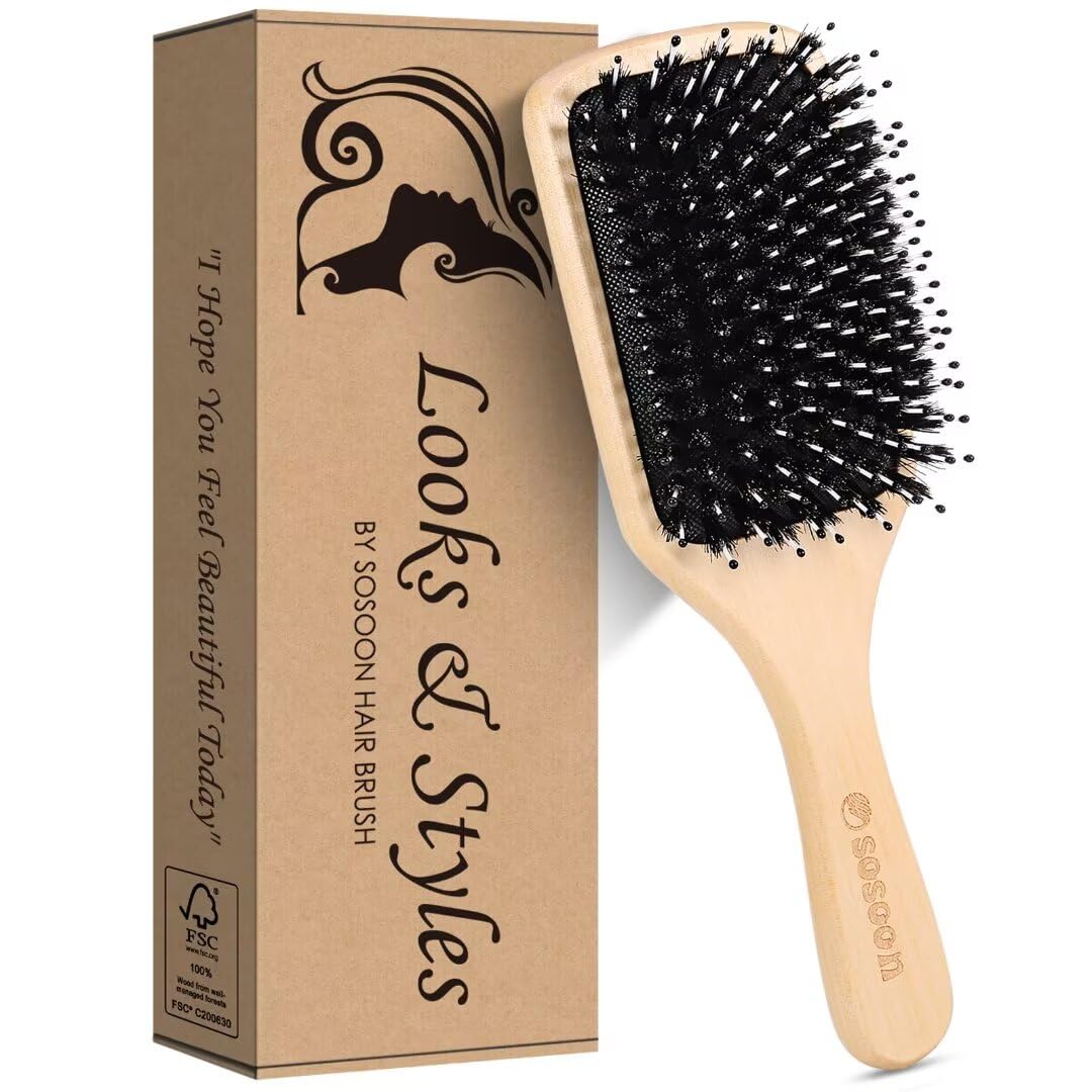 Sosoon brush held in hand showing scale and ergonomic control