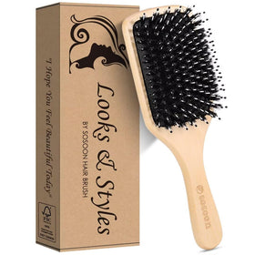 Sosoon brush held in hand showing scale and ergonomic control