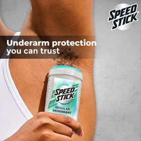 Hand holding Speed Stick to show size and travel-friendly benefit