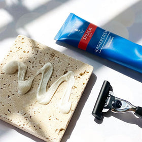 WALTER RAU Speick shave cream next to travel kit demonstrating compact portability