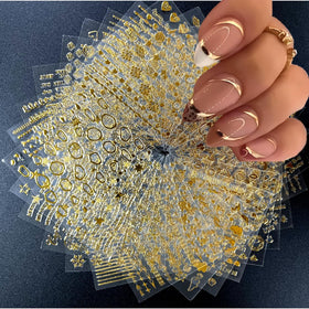 SPLOCUDU front packaging showing gold nail sticker set and benefits