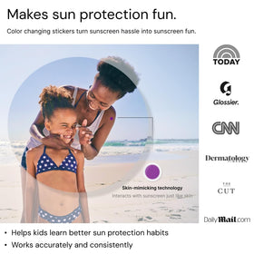 SPOTMYUV next to a sunscreen bottle to show scale and sizing benefit
