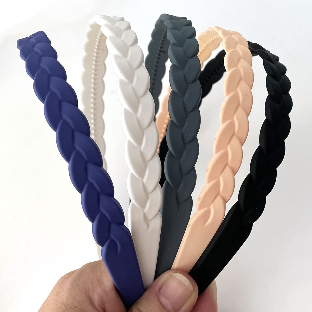 Springtime headband in use with a ponytail showing secure, no-slip styling benefit