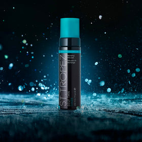 St.Tropez mousse texture close-up showing lightweight, quick-drying formula for smooth results
