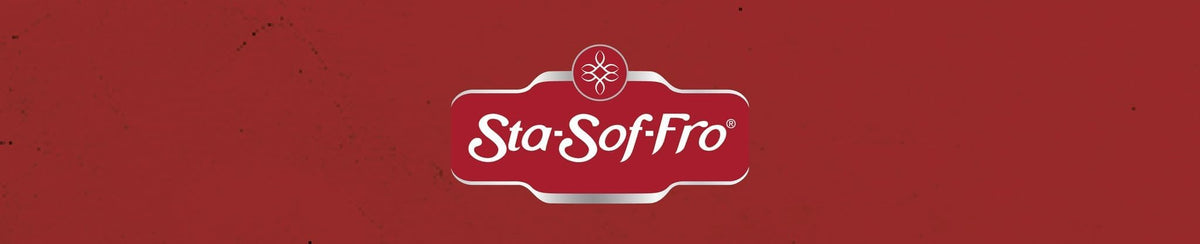 Sta-Sof-Fro being applied to curly hair to ease detangling