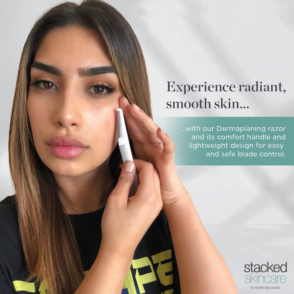 StackedSkincare blade attached to dermaplane handle demonstrating secure click-fit for safer use