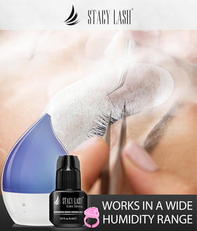 STACY LASH artist applying single-lash extensions to client demonstrating professional use