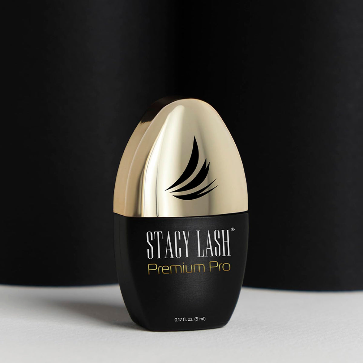 STACY LASH labelled bottle back displaying usage instructions and professional safety info