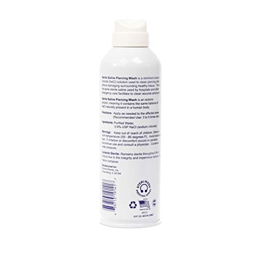 STERI - WASH spraying on a pierced ear demonstrating gentle, targeted cleansing