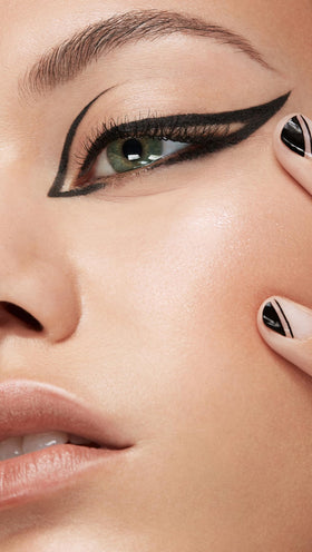 stila model applying winged eyeliner illustrating long-lasting, smudge-resistant wear