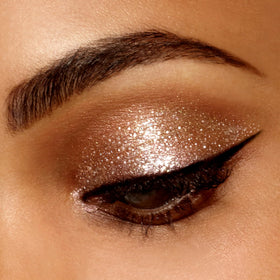 stila eye look in use demonstrating bright metallic lid and long-lasting sparkle benefit