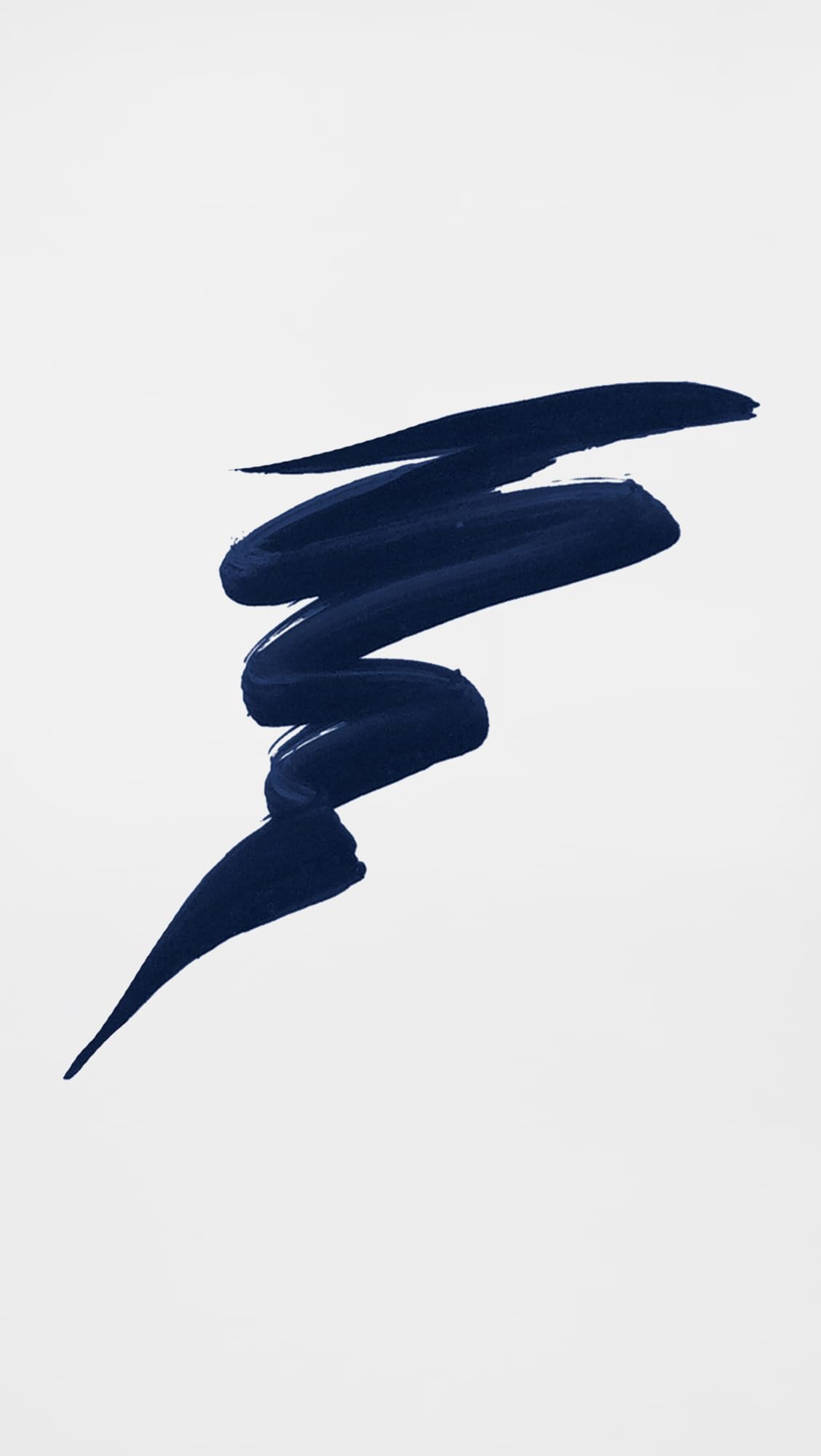 stila eyeliner next to lipstick showing compact size and portability