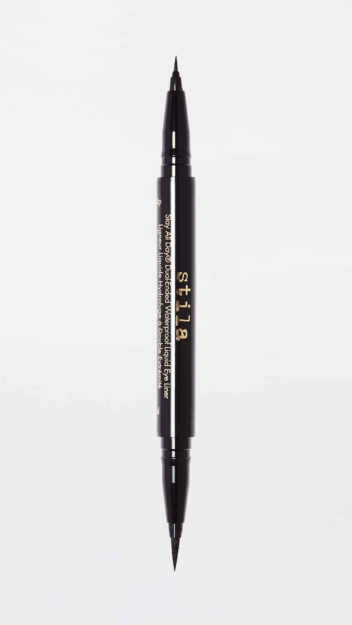 stila pen beside ruler showing size and portability for on-the-go touchups