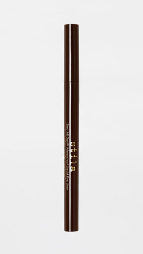 stila size and scale next to hand showing compact, travel-friendly design